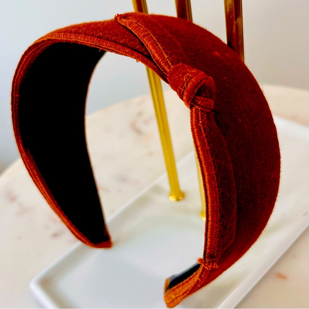 Jennifer Ouellette camel colored headband.